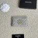 Chanel card holder with chain detail. #B45527