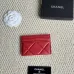 Chanel card holder with chain detail. #B45527