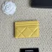 Chanel card holder with chain detail. #B45527