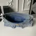 Chanel Women's Denim Tote Bag - Quilted Design, Light Blue Denim Fabric, Gold-Tone CC Logo & Chain Strap with Lock Detail, Spacious Luxury Handbag with Functional Pockets #B56722 Chanel Women's Denim Tote Bag - Quilted Design, Light Blue Denim Fabric, Gold-Tone CC Logo & Chain Strap with Lock Detail, Spacious Luxury Handbag with Functional Pockets #B56722