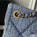 Chanel Women's Denim Tote Bag - Quilted Design, Light Blue Denim Fabric, Gold-Tone CC Logo & Chain Strap with Lock Detail, Spacious Luxury Handbag with Functional Pockets #B56722 Chanel Women's Denim Tote Bag - Quilted Design, Light Blue Denim Fabric, Gold-Tone CC Logo & Chain Strap with Lock Detail, Spacious Luxury Handbag with Functional Pockets #B56722