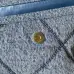 Chanel Women's Denim Tote Bag - Quilted Design, Light Blue Denim Fabric, Gold-Tone CC Logo & Chain Strap with Lock Detail, Spacious Luxury Handbag with Functional Pockets #B56722 Chanel Women's Denim Tote Bag - Quilted Design, Light Blue Denim Fabric, Gold-Tone CC Logo & Chain Strap with Lock Detail, Spacious Luxury Handbag with Functional Pockets #B56722