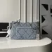 Chanel Women's Denim Tote Bag - Quilted Design, Light Blue Denim Fabric, Gold-Tone CC Logo & Chain Strap with Lock Detail, Spacious Luxury Handbag with Functional Pockets #B56722 Chanel Women's Denim Tote Bag - Quilted Design, Light Blue Denim Fabric, Gold-Tone CC Logo & Chain Strap with Lock Detail, Spacious Luxury Handbag with Functional Pockets #B56722