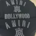 AMIRI Black Hoodie With Bold White Hollywood Logo And Ornate Emblem #B54241