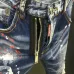 DSQ2 Men's Denim Jeans Edgy Distressed Design with Paint Splatter and Zipper Detail for Fashion Rebels #B54864