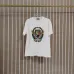 Balmain Paris White/Black T Shirt with Gold Chain and Blue Ribbon Circular Graphic Design for Men #B54209