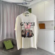 Gucci White T Shirt with Bold Handbag Graphic and Statement Typography Streetwear Inspired Design #B54213 Gucci White T Shirt with Bold Handbag Graphic and Statement Typography Streetwear Inspired Design #B54213