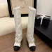 Chanel Knee - High Boots: Diverse Textures, Gold Chains, a Showcase of Luxe Creativity #B54142
