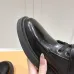 Louis Vuitton Shiny Black Ankle Boots with Lace-Up, Zipper and Decorative Straps #B54557