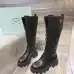 Prada's Stylish Black Lace-Up Knee-High Boots with Chunky Soles on Display #B54539