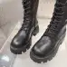 Prada's Stylish Black Lace-Up Knee-High Boots with Chunky Soles on Display #B54539