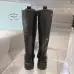 Prada's Stylish Black Lace-Up Knee-High Boots with Chunky Soles on Display #B54539