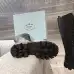 Prada's Stylish Black Lace-Up Knee-High Boots with Chunky Soles on Display #B54539