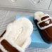 Prada Women's Shearling Lined Mule Slippers Triangle Logo Thick Sole Design for Cozy Luxury Winter Footwear #B57746