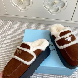 Prada Women's Shearling Lined Mule Slippers Triangle Logo Thick Sole Design for Cozy Luxury Winter Footwear #B57746