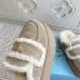 Prada Women's Shearling Lined Mule Slippers Triangle Logo Thick Sole Design for Cozy Luxury Winter Footwear #B57747