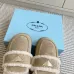 Prada Women's Shearling Lined Mule Slippers Triangle Logo Thick Sole Design for Cozy Luxury Winter Footwear #B57747