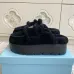 Prada Women's Shearling Lined Mule Slippers Triangle Logo Thick Sole Design for Cozy Luxury Winter Footwear #B57748