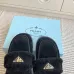 Prada Women's Shearling Lined Mule Slippers Triangle Logo Thick Sole Design for Cozy Luxury Winter Footwear #B57748