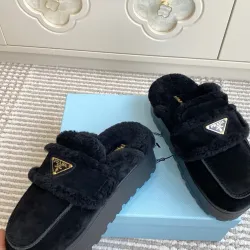 Prada Women's Shearling Lined Mule Slippers Triangle Logo Thick Sole Design for Cozy Luxury Winter Footwear #B57748