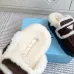Prada Women's Shearling Lined Mule Slippers Triangle Logo Thick Sole Design for Cozy Luxury Winter Footwear #B57749