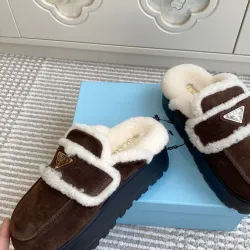 Prada Women's Shearling Lined Mule Slippers Triangle Logo Thick Sole Design for Cozy Luxury Winter Footwear #B57749