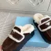 Prada Women's Shearling Lined Mule Slippers Triangle Logo Thick Sole Design for Cozy Luxury Winter Footwear #B57749