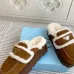 Prada Women's Shearling Lined Mule Slippers Triangle Logo Thick Sole Design for Cozy Luxury Winter Footwear #B57750