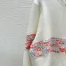2025 Chanel White Knit Sweater with Colorful Tweed Stripe and CC Logo #B54507