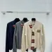2025  Miu Miu Women's Striped Knit Polo Sweater with a Quarter-Zip or Button Placket and Miu Miu Logo #B54795