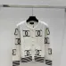 CHANEL Women's Luxury Cable Knit Cardigan  Featuring Bold Signature Double C Logo Intarsia and Contrast Striped Trims #B56312