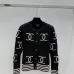 CHANEL Women's Luxury Cable Knit Cardigan  Featuring Bold Signature Double C Logo Intarsia and Contrast Striped Trims #B56312