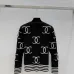 CHANEL Women's Luxury Cable Knit Cardigan  Featuring Bold Signature Double C Logo Intarsia and Contrast Striped Trims #B56312
