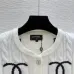 CHANEL Women's Luxury Cable Knit Cardigan  Featuring Bold Signature Double C Logo Intarsia and Contrast Striped Trims #B56312