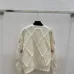 Chanel Women's Knitted Sweaters: Floral   CC Logo Embroidery with Argyle Design for Luxury Fashion Lovers #B56270