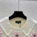 Chanel Women's Knitted Sweaters: Floral   CC Logo Embroidery with Argyle Design for Luxury Fashion Lovers #B56270