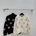 Chanel Women's Knitted Sweaters: Floral   CC Logo Embroidery with Argyle Design for Luxury Fashion Lovers #B56270