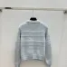Chanel Women's V   Neck Cardigans  Ribbed Knit with Iconic CC Logo and Button Detail for Luxury Lovers #B56275