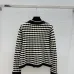Chanel Women's V   Neck Cardigans  Ribbed Knit with Iconic CC Logo and Button Detail for Luxury Lovers #B56277