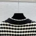 Chanel Women's V   Neck Cardigans  Ribbed Knit with Iconic CC Logo and Button Detail for Luxury Lovers #B56277