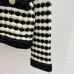 Chanel Women's V   Neck Cardigans  Ribbed Knit with Iconic CC Logo and Button Detail for Luxury Lovers #B56277