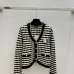 Chanel Women's V   Neck Cardigans  Ribbed Knit with Iconic CC Logo and Button Detail for Luxury Lovers #B56277
