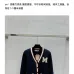 Dark Blue Miu Miu Women's V-Neck Cardigan  Embroidered "M" Logo  Textured Knit Design for Feminine Luxury  #B57741