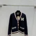 Dark Blue Miu Miu Women's V-Neck Cardigan  Embroidered "M" Logo  Textured Knit Design for Feminine Luxury  #B57741