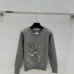 Dior Women's Authentic Luxury Cozy Knit Sweater with Intricate Sparkling Star Sequin Embellishment and Classic Crew Neck Design #B56278