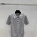 Fendi Women's Luxurious Short Sleeve Knit Polo Top Featuring Iconic FF Monogram Jacquard and Classic Contrast Collar. #B56304