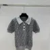 Fendi Women's Luxurious Short Sleeve Knit Polo Top Featuring Iconic FF Monogram Jacquard and Classic Contrast Collar. #B56304
