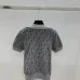 Fendi Women's Luxurious Short Sleeve Knit Polo Top Featuring Iconic FF Monogram Jacquard and Classic Contrast Collar. #B56304